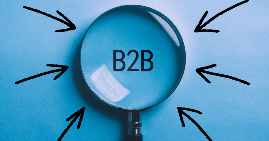 Μεγεθυντικός φακός με την ένδειξη B2B και βέλη που δείχνουν προς το κέντρο.